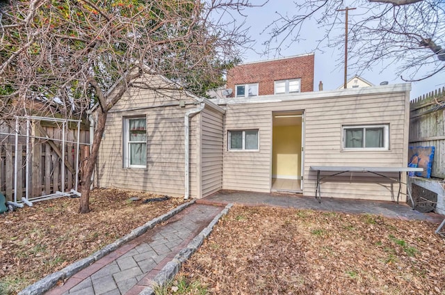 view of front of home with fence