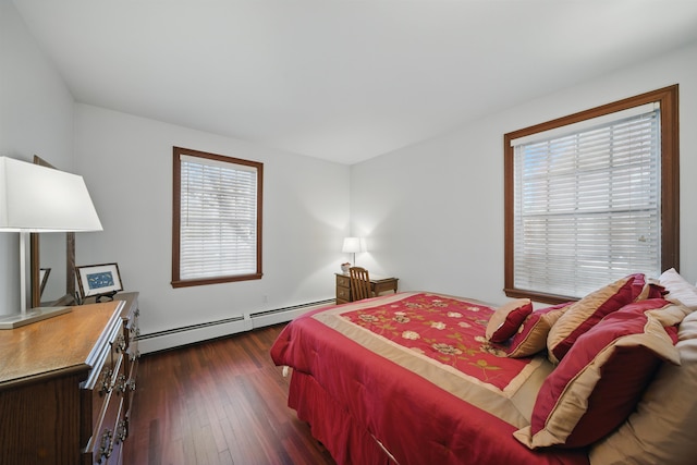 bedroom featuring a baseboard radiator and dark wood-style floors