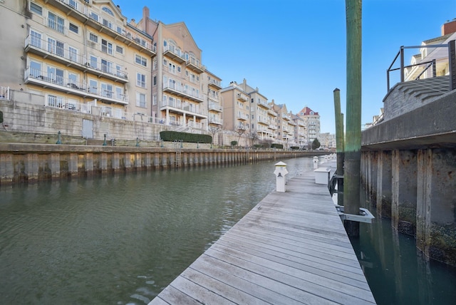 dock area with a water view