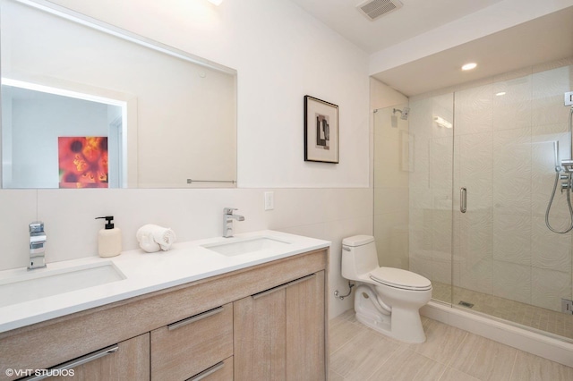 425 3rd St Unit 404, Jersey City, NJ 07302 - full bath featuring double vanity, a stall shower, recessed lighting, and tile walls