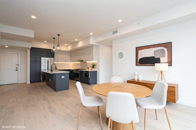 425 3rd St Unit 404, Jersey City, NJ 07302 - dining area with light wood finished floors and recessed lighting