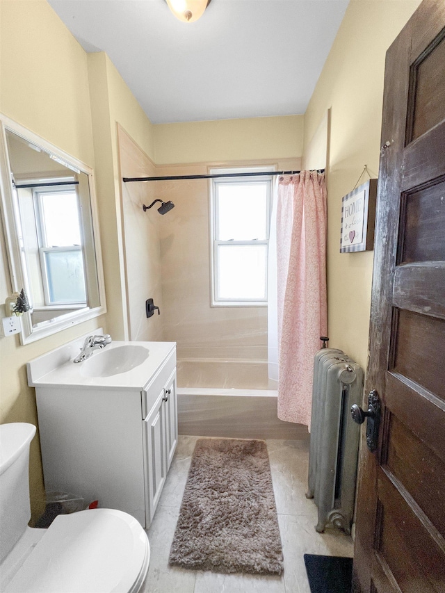 full bathroom featuring radiator, hardwood / wood-style floors, vanity, shower / bath combination with curtain, and toilet