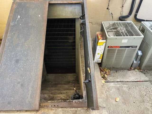 view of storm shelter with central AC