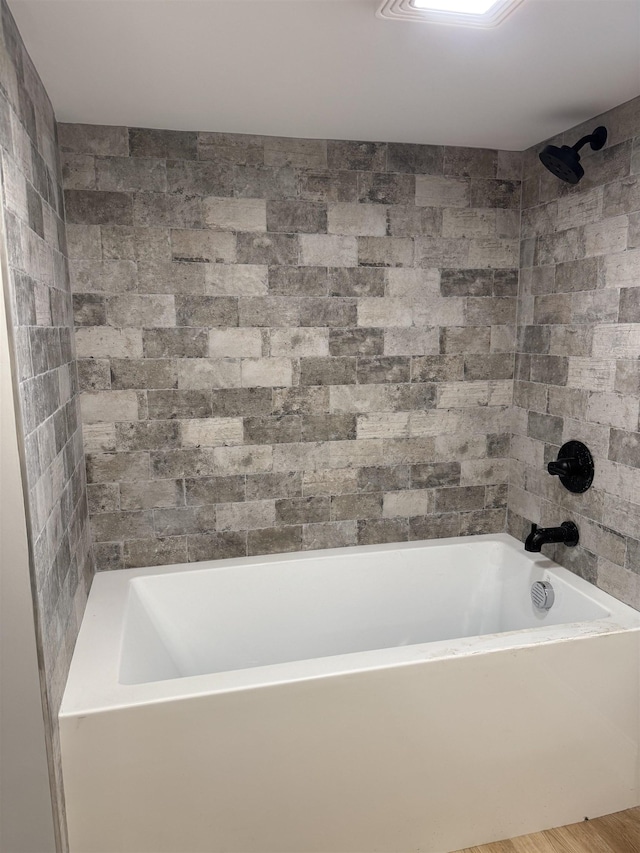 3 Raydol Ave, Secaucus, NJ 07094 - bathroom with shower / bathtub combination and wood finished floors
