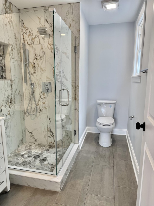 3 Raydol Ave, Secaucus, NJ 07094 - full bathroom with toilet and a marble finish shower