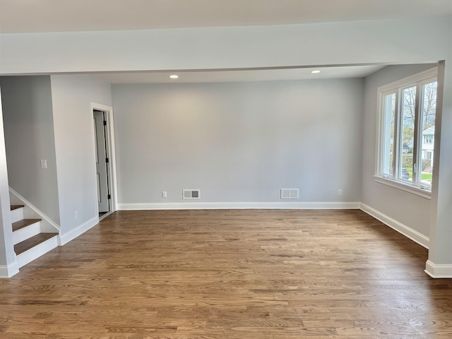 3 Raydol Ave, Secaucus, NJ 07094 - spare room with wood finished floors, recessed lighting, and stairs