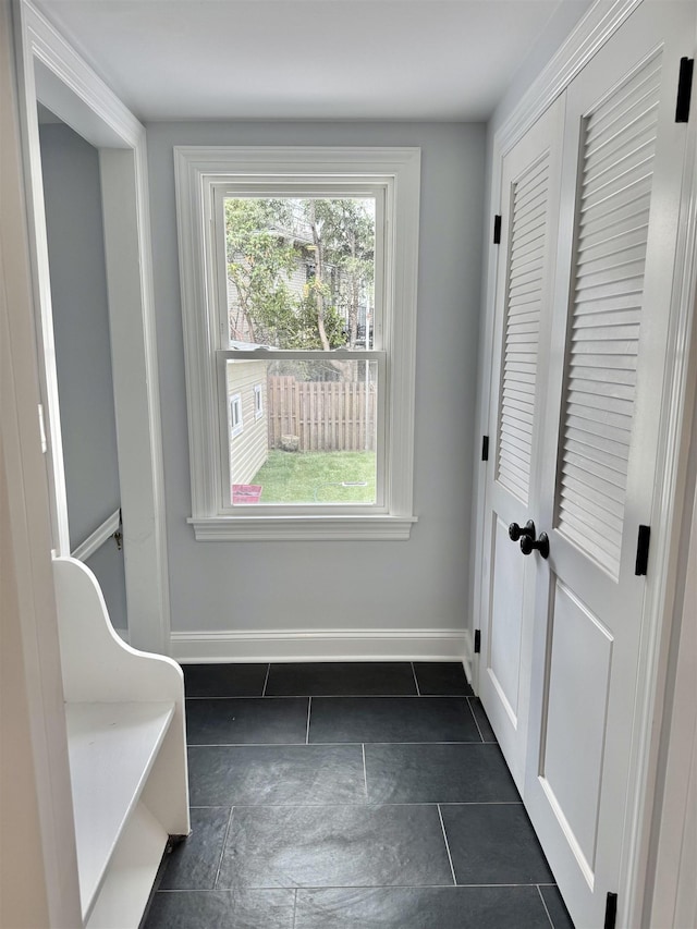 3 Raydol Ave, Secaucus, NJ 07094 - entryway with healthy amount of natural light and dark tile patterned floors