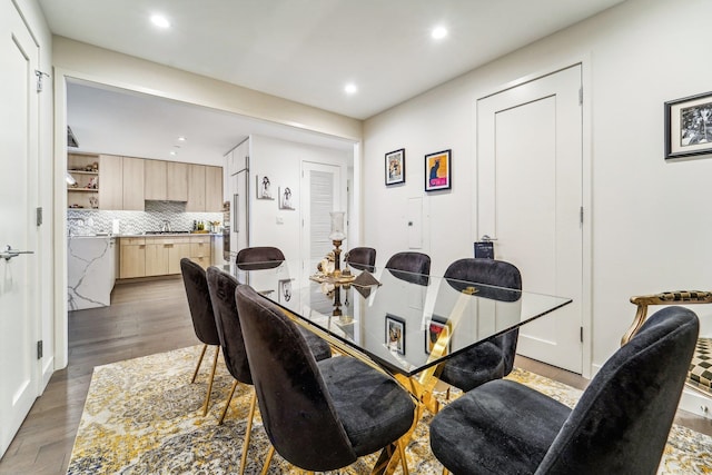 dining area featuring wood-type flooring