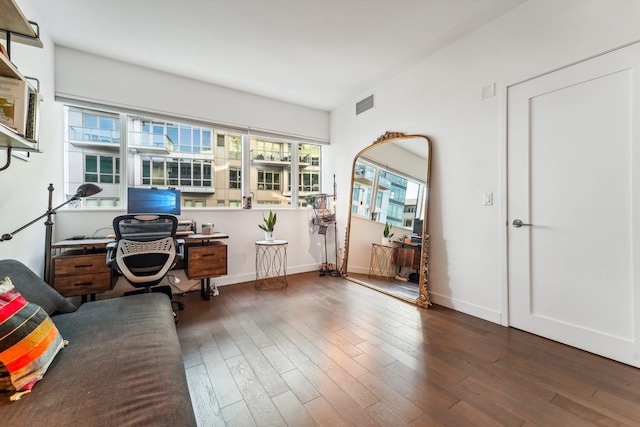 office space with hardwood / wood-style flooring