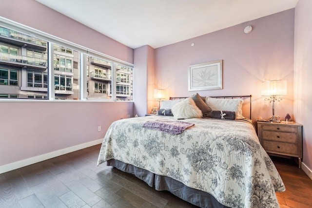 bedroom featuring dark wood-type flooring