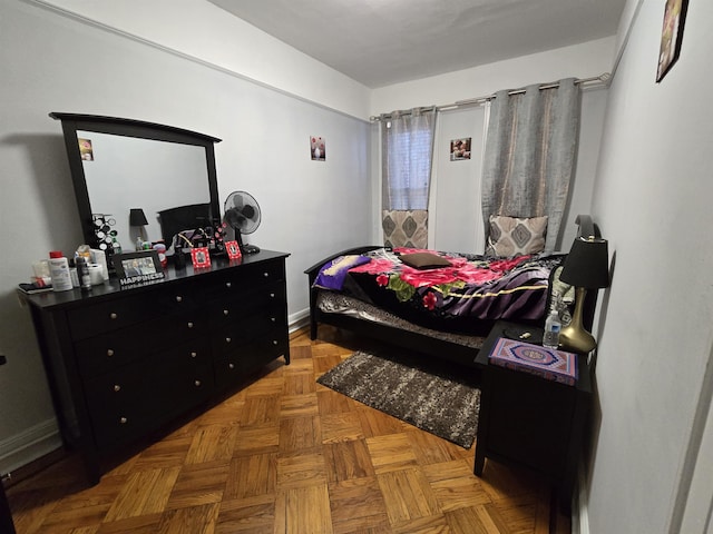 bedroom with baseboards