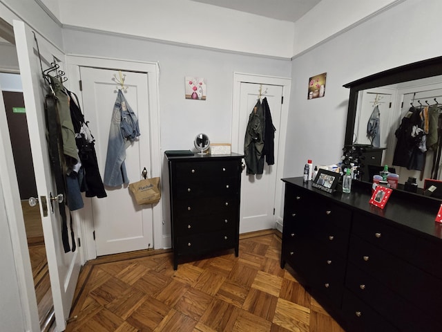 bedroom with two closets