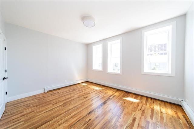 481 Martin Luther King Jr Dr, Jersey City, NJ 07304 - unfurnished room with light wood-style floors and baseboards