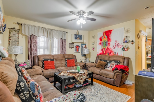 27 W 4th St, Bayonne, NJ 07002 - living area with a ceiling fan and wood finished floors