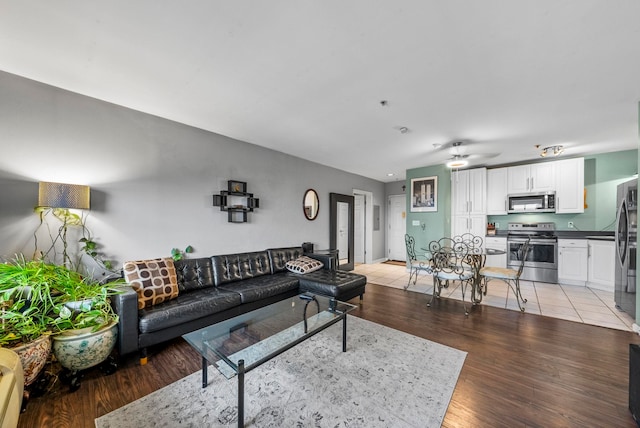 8915 Bergenwood Ave Unit 37, North Bergen, NJ 07047 - living area featuring light wood-type flooring and ceiling fan