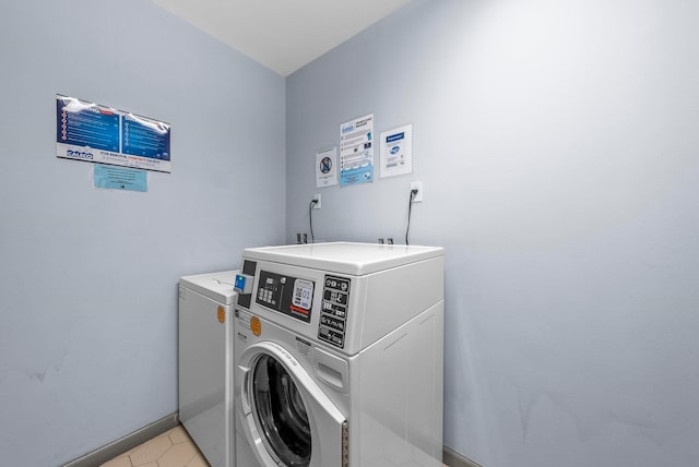 8915 Bergenwood Ave Unit 37, North Bergen, NJ 07047 - laundry room with washing machine and clothes dryer and baseboards