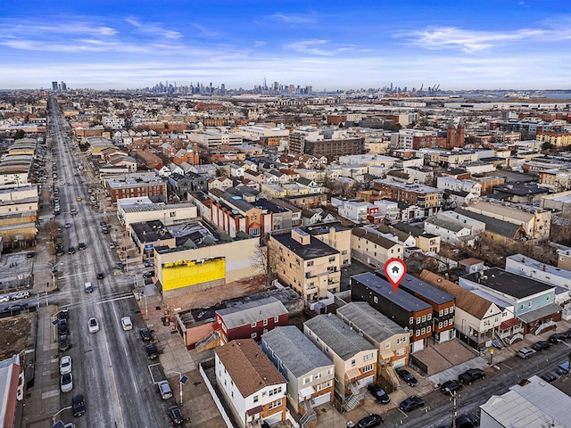 birds eye view of property with a city view