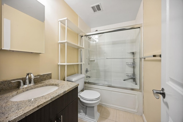 341 Monmouth St Unit 104D, Jersey City, NJ 07302 - full bathroom with vanity, shower / bath combination with glass door, and tile patterned floors