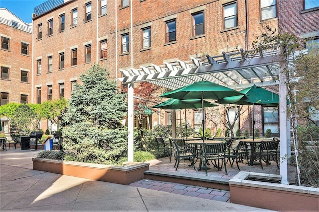 341 Monmouth St Unit 104D, Jersey City, NJ 07302 - view of patio / terrace with a pergola
