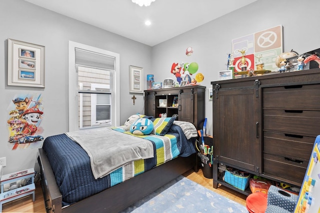 bedroom featuring light hardwood / wood-style flooring