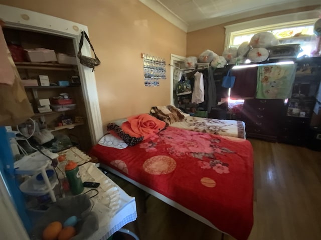 143 64th St, West New York, NJ 07093 - bedroom featuring wood finished floors and crown molding