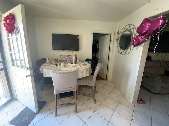 143 64th St, West New York, NJ 07093 - dining space featuring light tile patterned flooring