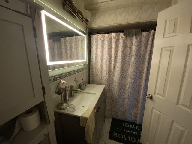 143 64th St, West New York, NJ 07093 - full bath with vanity, tile patterned floors, and a shower with shower curtain