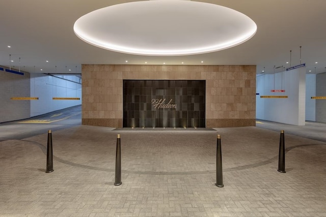 99 Hudson St Unit 4903, Jersey City, NJ 07302 - lobby featuring tile walls and recessed lighting