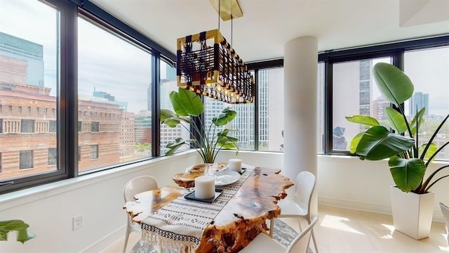 10 Provost St Unit 1004, Jersey City, NJ 07302 - dining room with plenty of natural light, baseboards, and a view of city