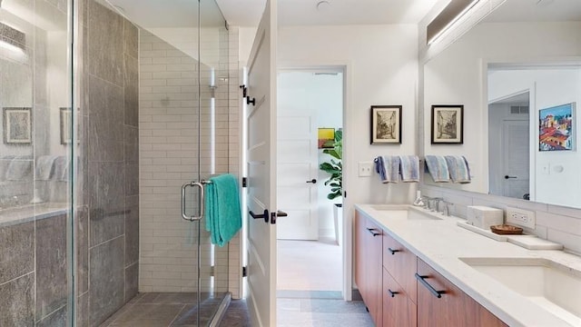 10 Provost St Unit 1004, Jersey City, NJ 07302 - bathroom with a stall shower and double vanity