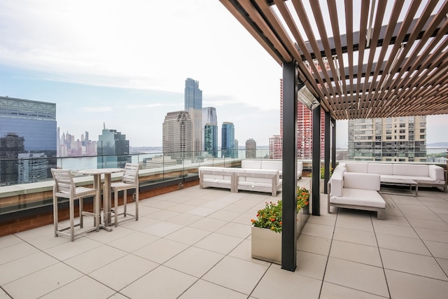10 Provost St Unit 1004, Jersey City, NJ 07302 - view of patio / terrace with a balcony, a view of skyline, and outdoor lounge area
