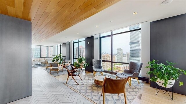10 Provost St Unit 1004, Jersey City, NJ 07302 - common area with expansive windows and wooden ceiling