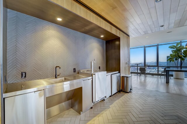 10 Provost St Unit 1004, Jersey City, NJ 07302 - kitchen featuring stainless steel counters, a sink, and expansive windows