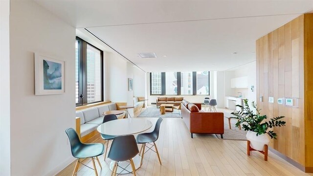 10 Provost St Unit 1004, Jersey City, NJ 07302 - dining space with plenty of natural light and light wood finished floors