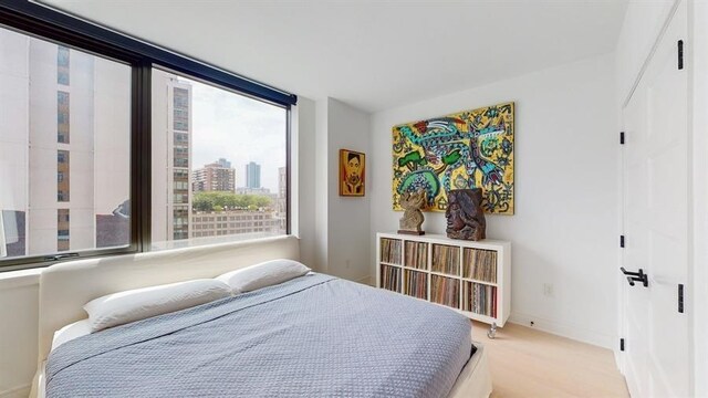 10 Provost St Unit 1004, Jersey City, NJ 07302 - carpeted bedroom with baseboards