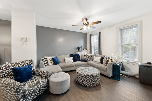 living room with hardwood / wood-style floors and ceiling fan