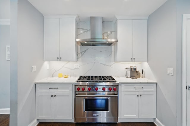 12 Stephen Pl, Little Falls, NJ 07424 - kitchen featuring wall chimney exhaust hood, designer stove, white cabinets, light countertops, and backsplash