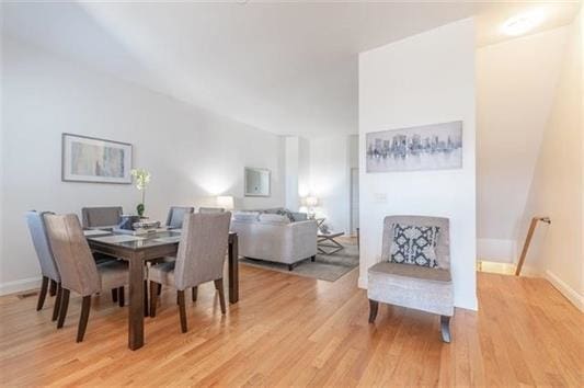 dining room featuring light hardwood / wood-style floors