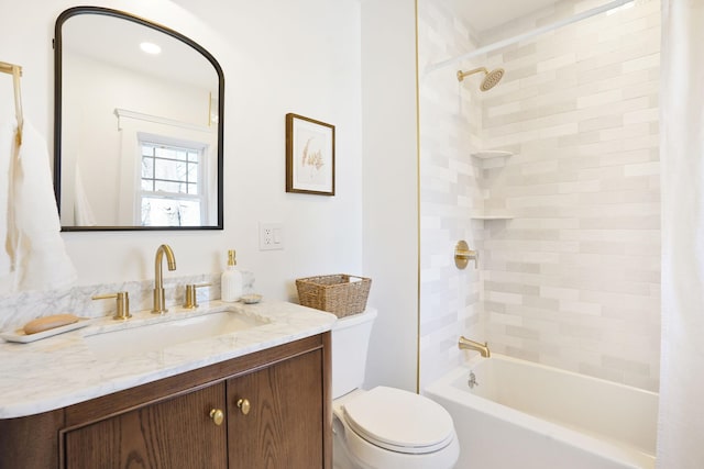 bathroom featuring toilet, shower / tub combo with curtain, and vanity