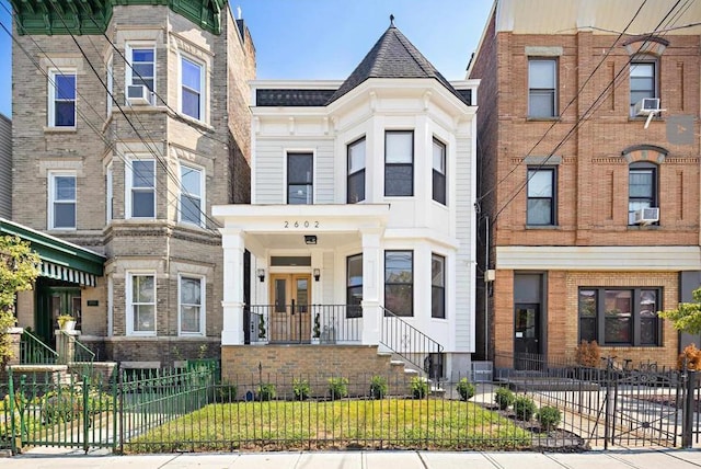2602 Palisade Ave, Weehawken, NJ 07086 - view of front of house with a fenced front yard