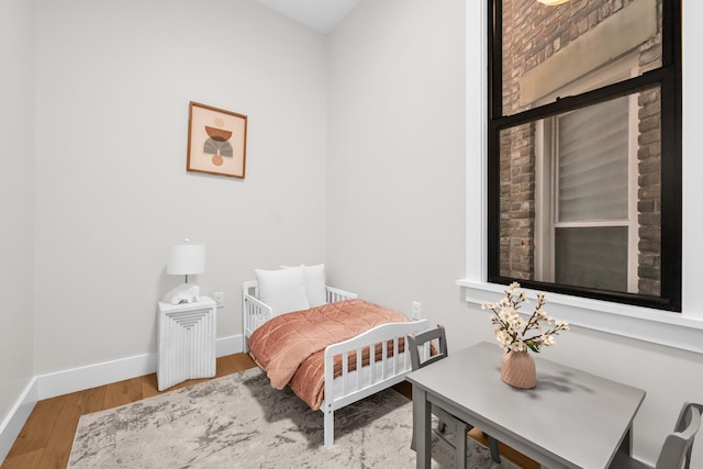 2602 Palisade Ave, Weehawken, NJ 07086 - bedroom featuring wood finished floors and baseboards