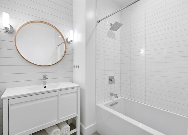 2602 Palisade Ave, Weehawken, NJ 07086 - bathroom featuring vanity, washtub / shower combination, and wooden walls