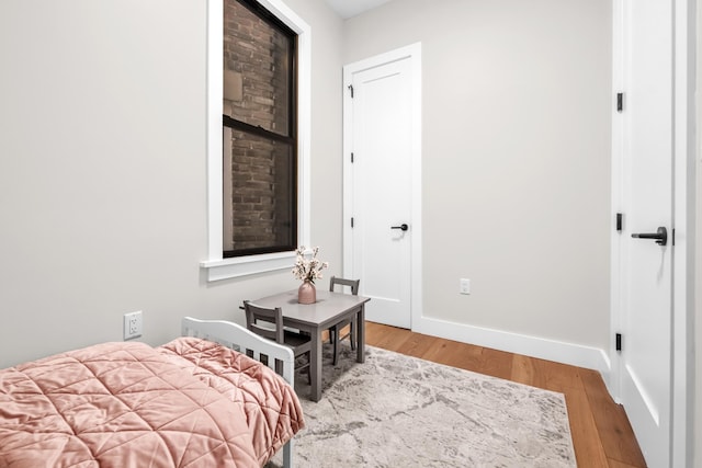 2602 Palisade Ave, Weehawken, NJ 07086 - bedroom with light wood-type flooring and baseboards