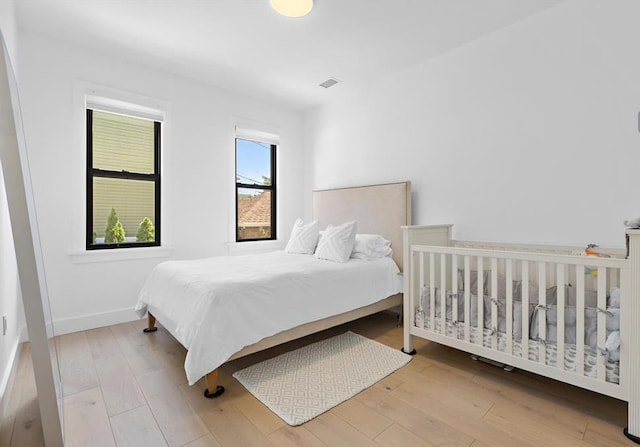 2602 Palisade Ave, Weehawken, NJ 07086 - bedroom featuring hardwood / wood-style flooring and baseboards