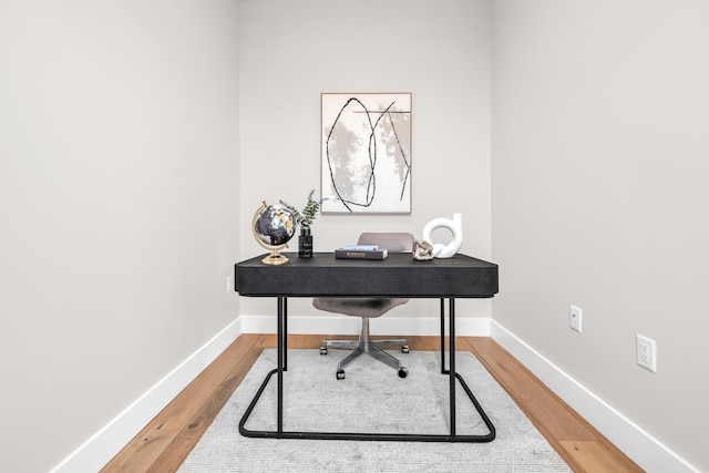 2602 Palisade Ave, Weehawken, NJ 07086 - office area featuring baseboards and wood finished floors