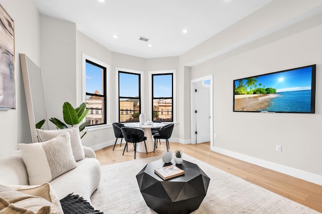 2602 Palisade Ave, Weehawken, NJ 07086 - living room featuring light wood-style floors, baseboards, and recessed lighting