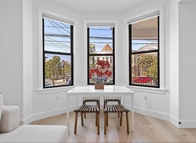 2602 Palisade Ave, Weehawken, NJ 07086 - dining room with light wood-type flooring and baseboards