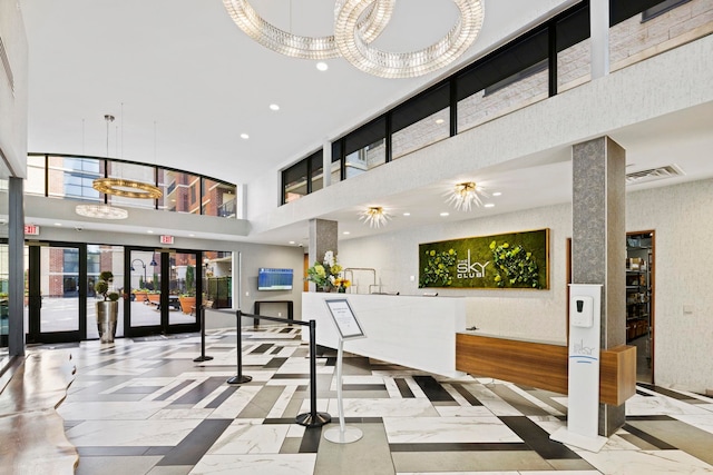 700 1st St Unit 6D, Hoboken, NJ 07030 - building lobby featuring a high ceiling and recessed lighting