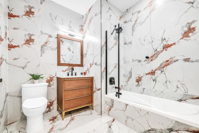 bathroom featuring toilet, stone wall, and vanity