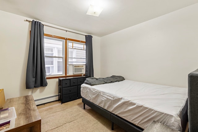 bedroom with light colored carpet, cooling unit, and a baseboard heating unit